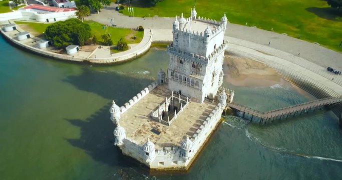 Aerial view of Belem Tower built on a small island in the Tagus River with Lisbon in the background. Portugal
