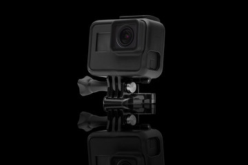 Action camera isolated on black background