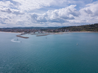 Fototapeta na wymiar Italia, maggio 2019 - vista panoramica della citta di pesaro e della falesia a picco sul mare del parco san bartolo 