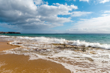 Panorama of beautiful beach and tropical sea of Lanzarote. Canaries