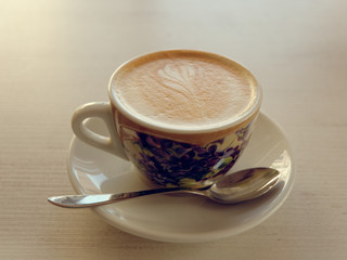 cup of mococino cappuccino coffee on the table