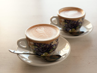 cup of mococino cappuccino coffee on the table