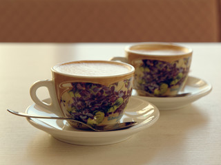 cup of mococino cappuccino coffee on the table