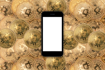 smartphone on bitcoins as background.