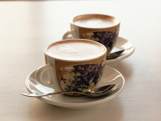 cup of mococino cappuccino coffee on the table