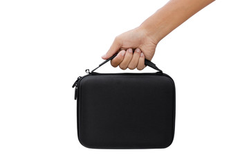 hand holding black bag isolated on white background - clipping paths.