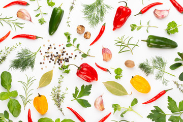 Spice herbal leaves and chili pepper on white background. Vegetables pattern. Floral and vegetables on white background. Top view, flat lay.