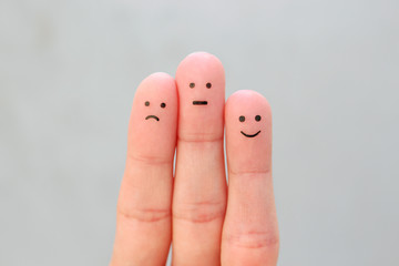 Fingers art of people. Concept of positive and negative emotions.