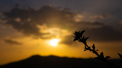 Beautiful landscape in the mountains at sunset. View of colorful sky with amazing clouds.