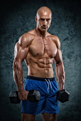 Fototapeta na wymiar Handsome Muscular Men Lifting Weights, kettlebell