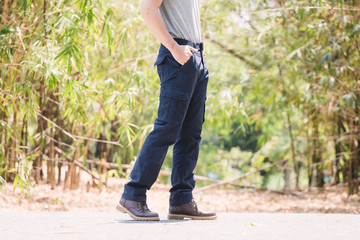 Model wearing blue   color cargo pants or cargo trousers