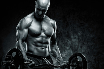 Fototapeta na wymiar Handsome Muscular Men Lifting Weights, kettlebell