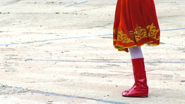 Teenager dancing folk dance in folk costume