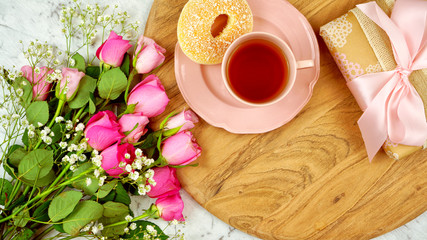 Feminine leisure and relaxation flat lay overhead, sunday morning brunch, Mother's Day, birthday or Valentine's celebration.