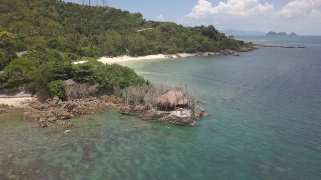 Drone flying above koh Raham area, Haad Son sand beach and Secret beach at koh Phangan island,Thailand,no color grading