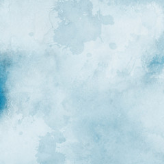 Colorful winter blue ink and watercolor textures on white paper background. Paint leaks and ombre effects. Hand painted abstract image. Deep sea.