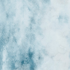 Colorful winter blue ink and watercolor textures on white paper background. Paint leaks and ombre effects. Hand painted abstract image. Deep sea.