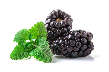 Closeup shot of fresh blackberries. Isolated on white