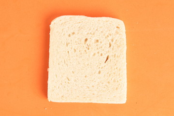 bread without rind in colorful background..