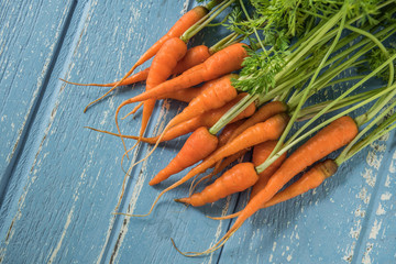 Fresh and sweet carrot on wooden table