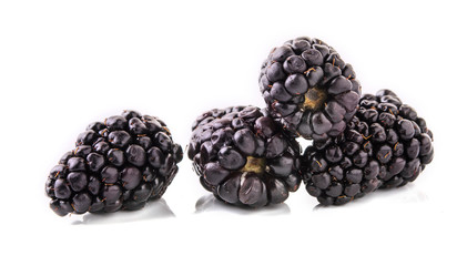 Closeup shot of fresh blackberries. Isolated on white