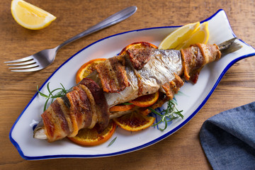 Grilled Bacon-Wrapped Whitefish. Fish wrapped with bacon