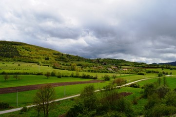 Naklejka premium spring landscape in front of the rain