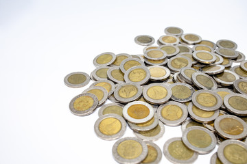 Currency in Thai baht Coin with golden and silver color on white background. Abstract of saving money