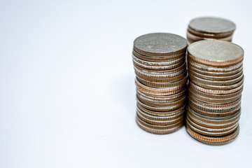 Currency in Thai baht with silver coins on white background. Abstract of saving money