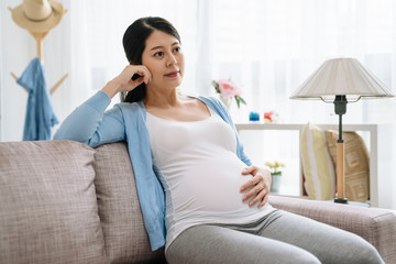 pregnant asian woman expecting baby happy parent