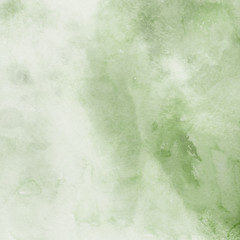 Green ink and watercolor textures on white paper background. Paint leaks and ombre effects. Hand painted abstract image.