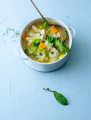 Fish stew. Fish soup with vegetables in a pot