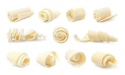 Set of delicious chocolate curls on white background