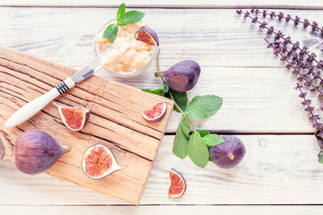 sliced figs with ricotta and mint