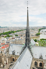Fototapeta na wymiar The spire of Notre-Dame Cathedral (Cathedrale Notre-Dame de Paris) from above. Paris. France