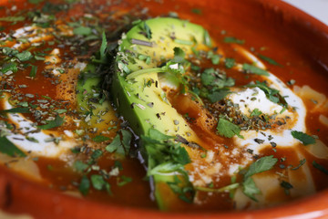 Tortilla Soup with fresh avocado and cream 