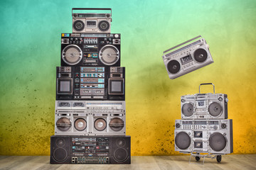 Retro old design ghetto blaster boombox radio cassette tape recorders tower from circa 1980s,...