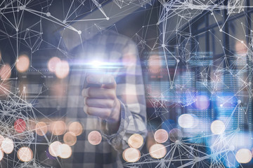 persons hand hold a device with a flash or flare pop from it, digital network surround b