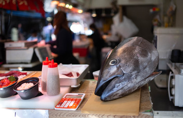 Tuna fish getting prepared for sushi sashimi in market