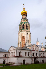 Birds flying around bell tower of St. Sophia Cathedral of Vologda