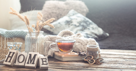 Still life details of home interior on a wooden table