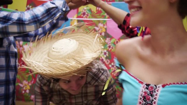 Couples dancing Quadrilha, a traditional style of Festa Junina: June  Party. Slow Motion