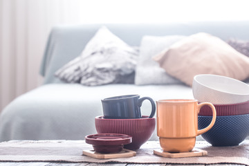 still life interior decor with home utensils on a wooden table