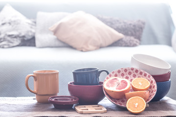still life interior decor with home utensils on a wooden table