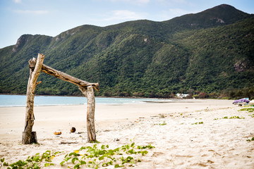 wooden frame at beach on con dao island, vietnam - obrazy, fototapety, plakaty