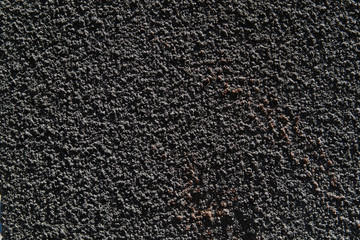 The texture of the concrete wall. A raw plaster wall background
