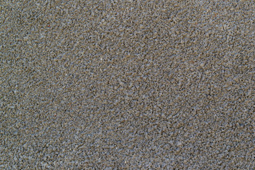 The texture of the concrete wall. A raw plaster wall background