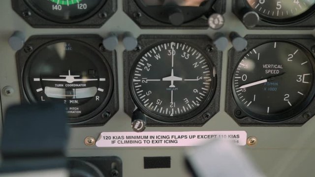 Extreme close up still shot of an aircraft's cockpit instruments including Vertical Speed Gauge and Turn Coordinator, GBR, Lady Elliot Island