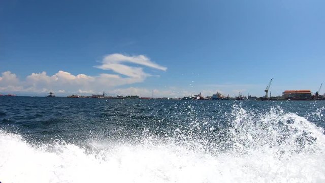 Footage of Water Splash By A Speed Boat In The Sea