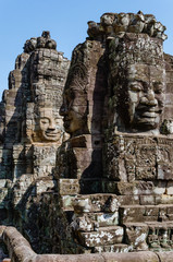 Fototapeta na wymiar Smiling Faces of Bayon Temple in Angkor Thom is The Heritage of Khmer Empire at Siem Reap Province, Cambodia.